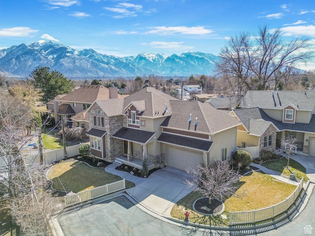 aerial view featuring a residential view and a mountain view