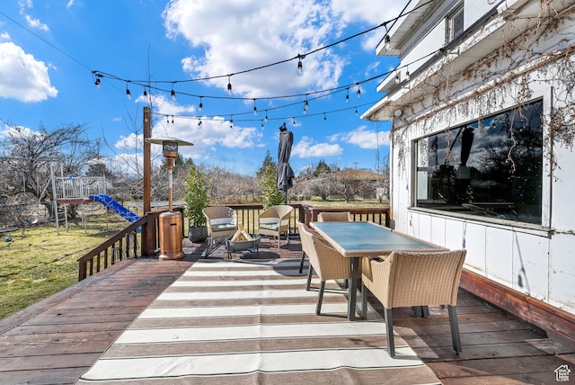wooden deck with outdoor dining area