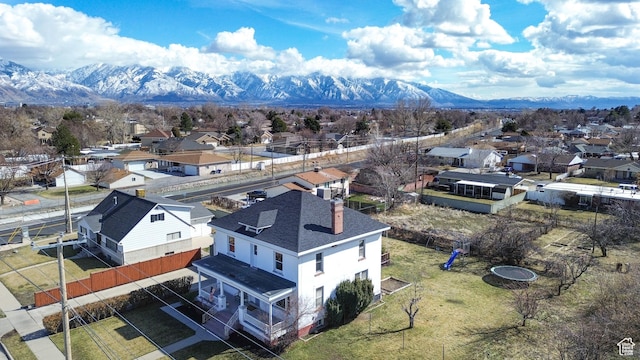 bird's eye view with a mountain view and a residential view