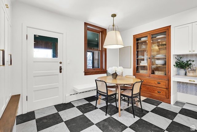 dining room featuring a baseboard radiator