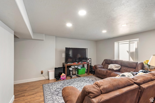 1933 E Handcart Ln N, Spanish Fork, UT 84660 - living area with a textured ceiling, baseboards, wood finished floors, and recessed lighting