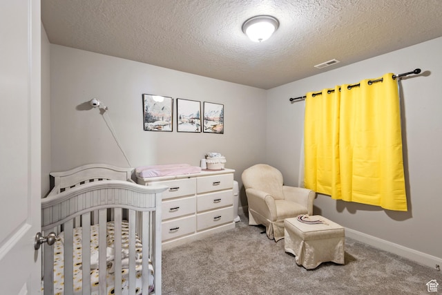 1933 E Handcart Ln N, Spanish Fork, UT 84660 - carpeted bedroom with a textured ceiling, a nursery area, visible vents, and baseboards