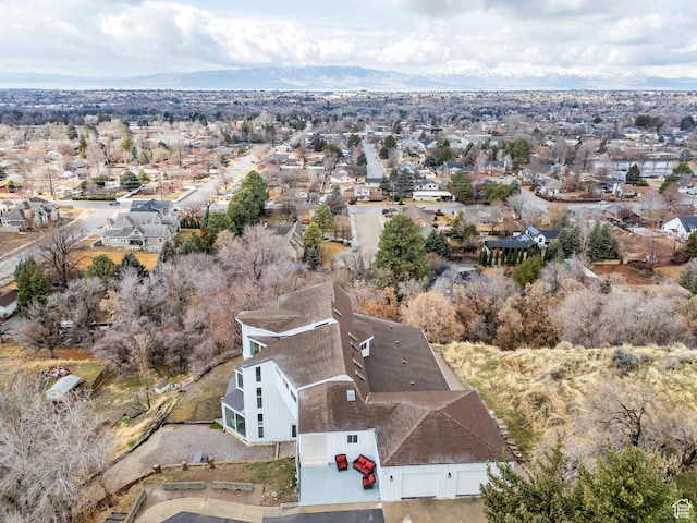 drone / aerial view with a residential view and a mountain view