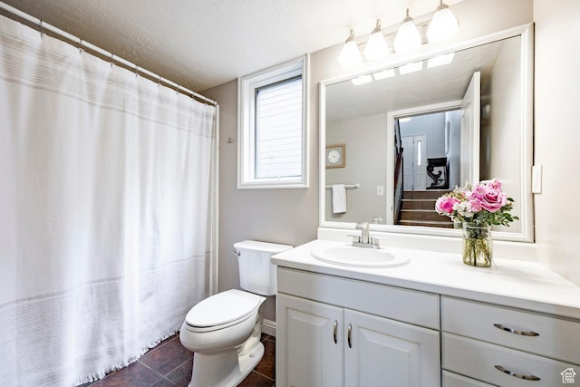 1494 W Meadow Loop Rd, Park City, UT 84098 - full bath with tile patterned floors, a textured ceiling, toilet, and vanity