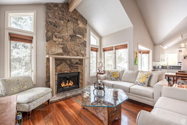 1494 W Meadow Loop Rd, Park City, UT 84098 - living room featuring a healthy amount of sunlight, a fireplace, high vaulted ceiling, and hardwood / wood-style flooring