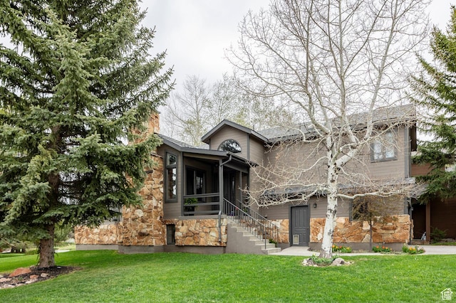 1494 W Meadow Loop Rd, Park City, UT 84098 - view of front of property featuring stone siding, stairway, and a front lawn