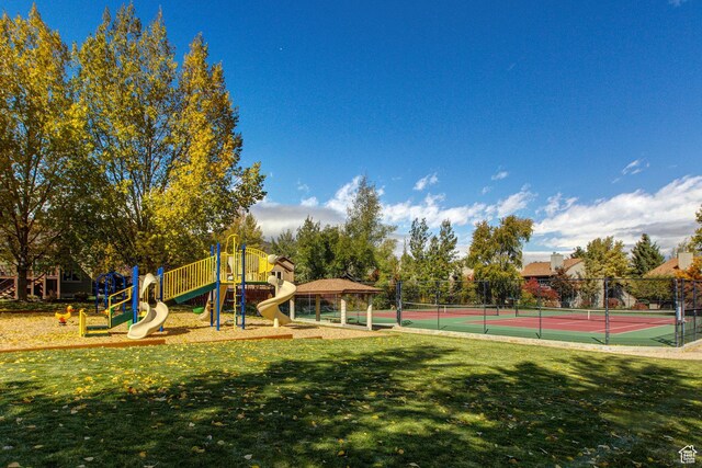 1494 W Meadow Loop Rd, Park City, UT 84098 - view of tennis court featuring playground community, a yard, and fence