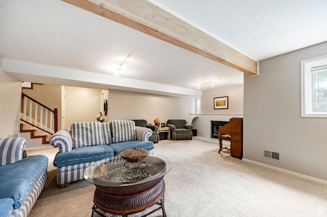 1494 W Meadow Loop Rd, Park City, UT 84098 - living room with visible vents, stairway, a brick fireplace, carpet floors, and beamed ceiling