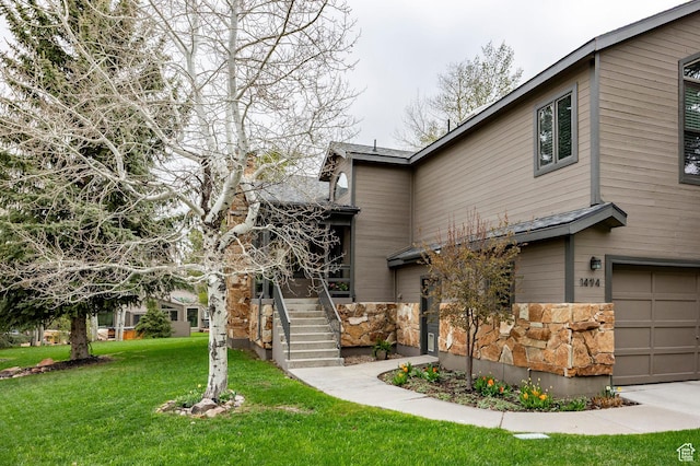 1494 W Meadow Loop Rd, Park City, UT 84098 - view of property exterior featuring a yard, stairs, an attached garage, and stone siding
