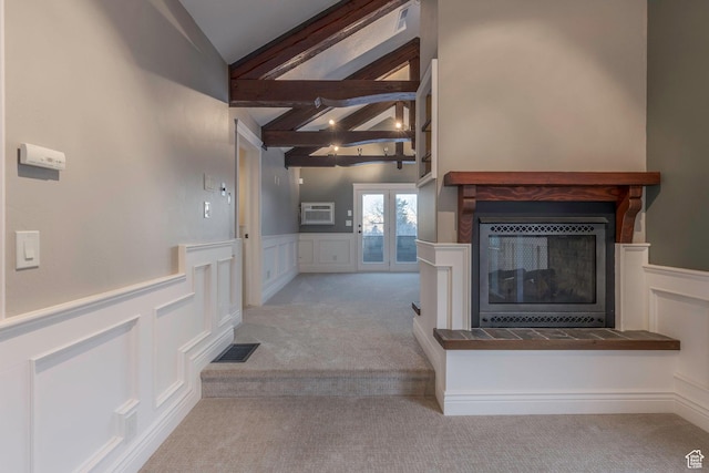 2008 N 3850 E, Eden, UT 84310 - unfurnished living room with vaulted ceiling with beams, carpet, a decorative wall, and visible vents
