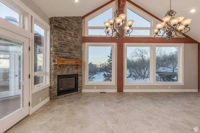 2008 N 3850 E, Eden, UT 84310 - unfurnished living room with a chandelier, plenty of natural light, and a fireplace