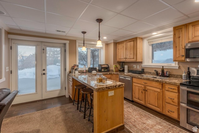 2008 N 3850 E, Eden, UT 84310 - kitchen featuring a kitchen breakfast bar, french doors, visible vents, appliances with stainless steel finishes, and a sink