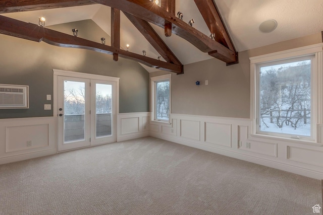 2008 N 3850 E, Eden, UT 84310 - spare room featuring a wealth of natural light, lofted ceiling with beams, and light colored carpet