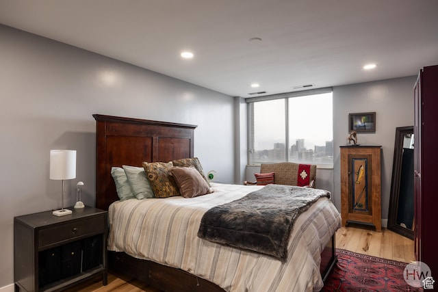 777 E S Temple S Unit 11F, Salt Lake City, UT 84102 - bedroom with light wood-style flooring and recessed lighting