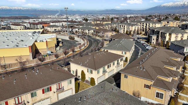 aerial view featuring a mountain view and a residential view