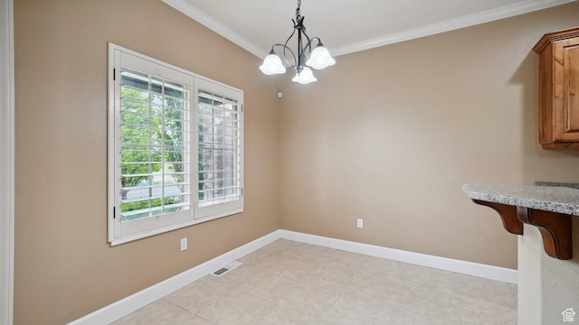 unfurnished dining area featuring an inviting chandelier, visible vents, crown molding, and baseboards