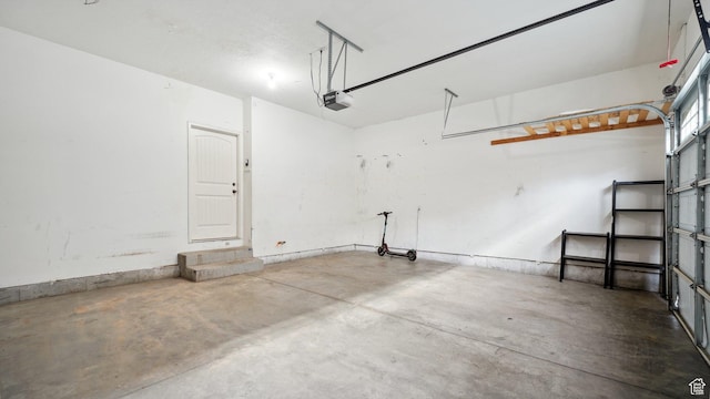 garage featuring a garage door opener