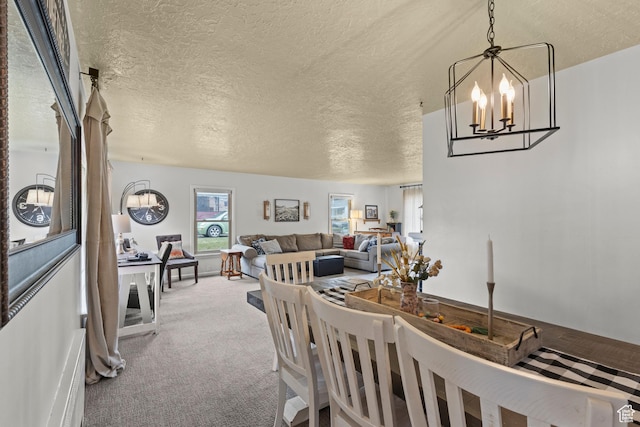 162 S 3 E, Preston, ID 83263 - carpeted dining area with a notable chandelier and a textured ceiling