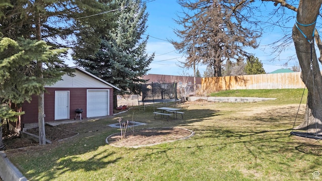 162 S 3 E, Preston, ID 83263 - view of yard with fence, a trampoline, and an outdoor structure