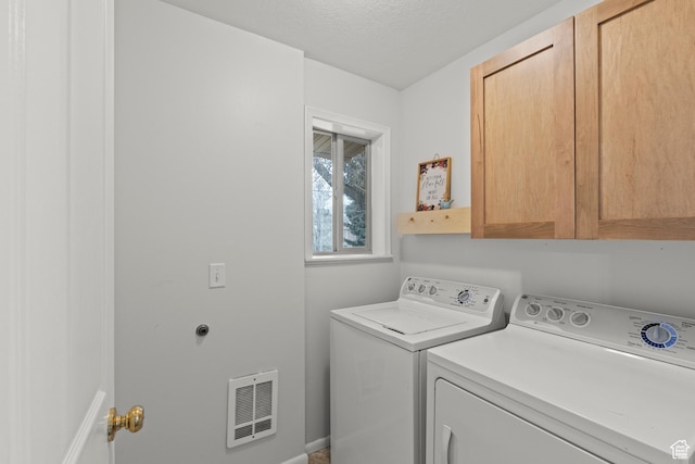 162 S 3 E, Preston, ID 83263 - washroom with cabinet space, a textured ceiling, visible vents, and washer and clothes dryer
