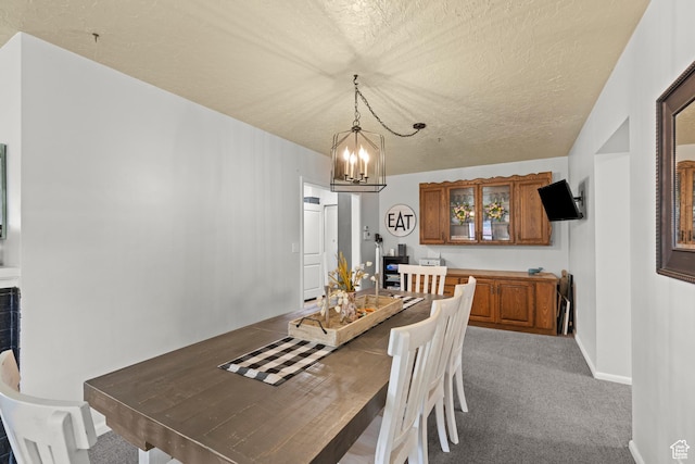 162 S 3 E, Preston, ID 83263 - dining area featuring light colored carpet, a notable chandelier, baseboards, and a textured ceiling