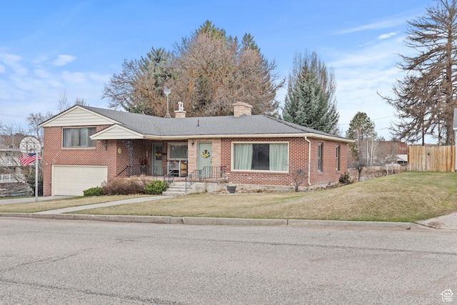 162 S 3 E, Preston, ID 83263 - view of front of property featuring a chimney, fence, brick siding, a front lawn, and a garage