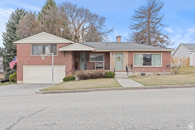 view of front of home featuring concrete driveway, a chimney, fence, brick siding, and a garage