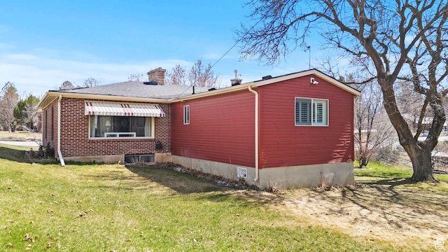 162 S 3 E, Preston, ID 83263 - view of property exterior featuring a chimney and a yard