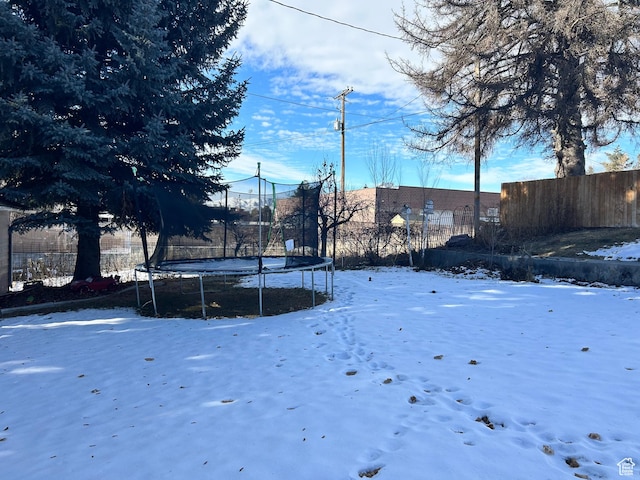 162 S 3 E, Preston, ID 83263 - yard covered in snow featuring fence and a trampoline
