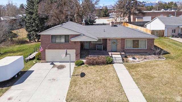 162 S 3 E, Preston, ID 83263 - view of front of property with driveway, a front yard, a garage, and brick siding
