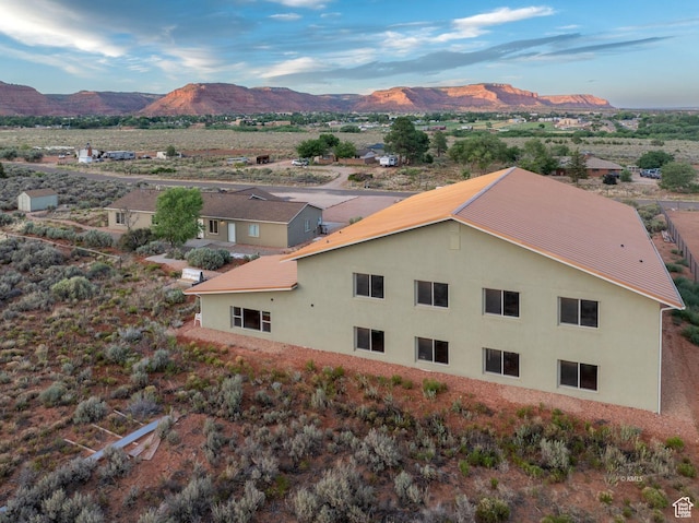 drone / aerial view featuring a mountain view