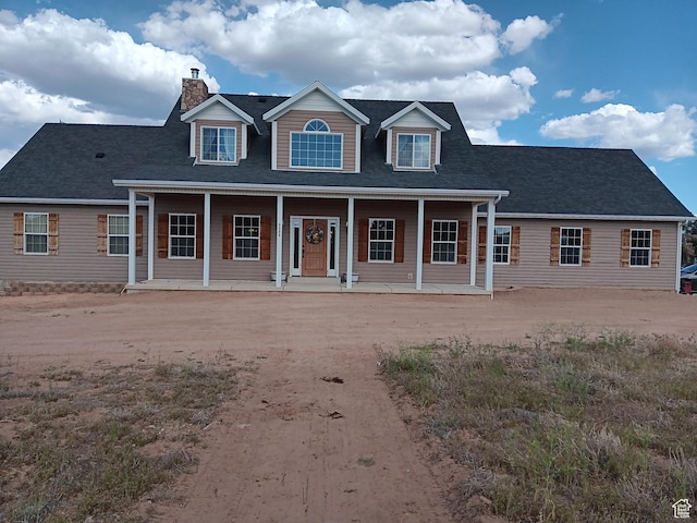 4680 N 4500 W, Cedar City, UT 84721 - view of front of house featuring a porch and a chimney