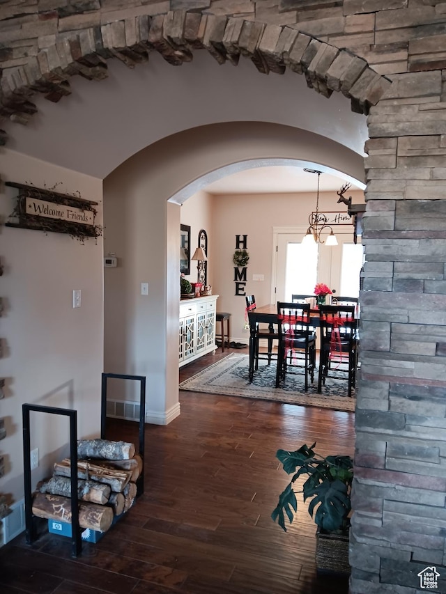 4680 N 4500 W, Cedar City, UT 84721 - dining room with arched walkways, baseboards, and hardwood / wood-style floors