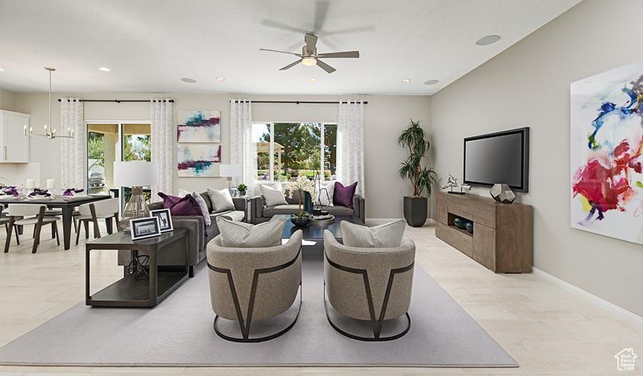 635 S 230 W Unit 5, Ivins, UT 84738 - living room with recessed lighting, baseboards, ceiling fan with notable chandelier, and a glass covered fireplace