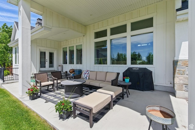 view of patio with french doors, outdoor lounge area, and grilling area