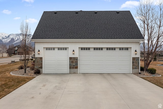 garage featuring a mountain view