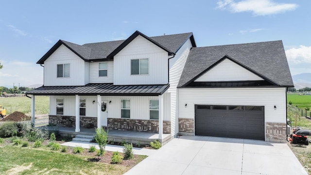 637 S 4th W, Preston, ID 83263 - modern inspired farmhouse with a standing seam roof, a porch, roof with shingles, concrete driveway, and a garage