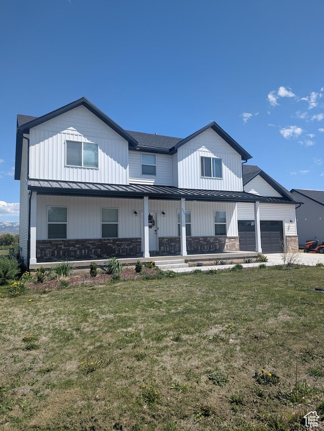 637 S 4th W, Preston, ID 83263 - modern inspired farmhouse featuring a standing seam roof, a garage, metal roof, covered porch, and a front yard