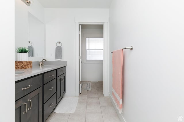 637 S 4th W, Preston, ID 83263 - full bath with double vanity, tile patterned flooring, and baseboards