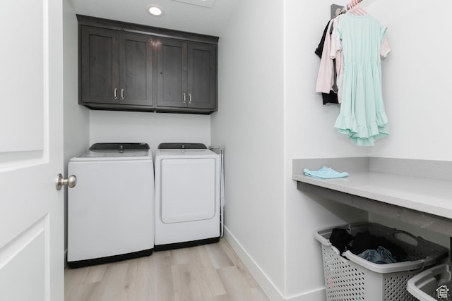 637 S 4th W, Preston, ID 83263 - laundry area featuring cabinet space, washing machine and clothes dryer, light wood finished floors, baseboards, and recessed lighting