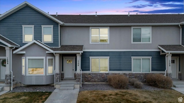 1704 E Talon Way, Eagle Mountain, UT 84005 - view of front facade featuring roof with shingles and stone siding