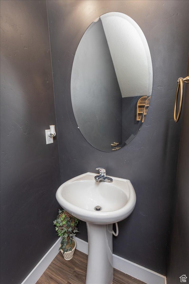1704 E Talon Way, Eagle Mountain, UT 84005 - bathroom featuring baseboards and wood finished floors