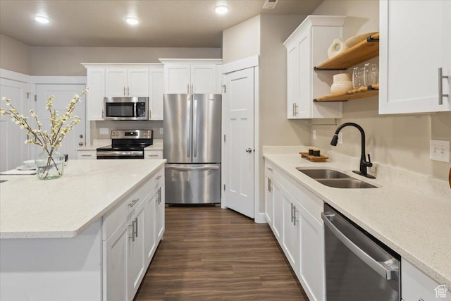 1704 E Talon Way, Eagle Mountain, UT 84005 - kitchen with white cabinets, open shelves, appliances with stainless steel finishes, and a sink