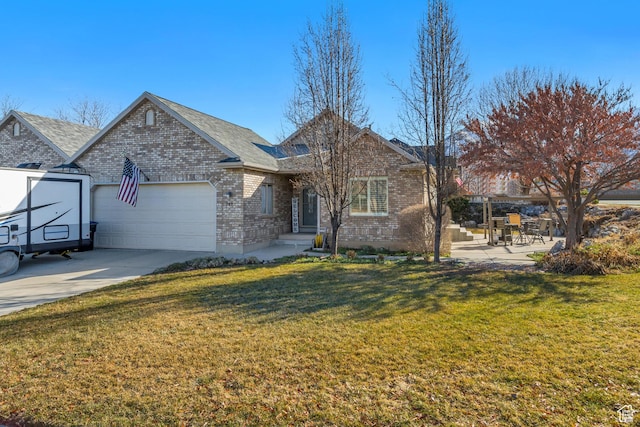 view of front facade featuring a garage, brick siding, driveway, and a front lawn