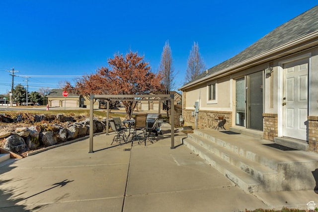 view of patio with outdoor dining area and a pergola