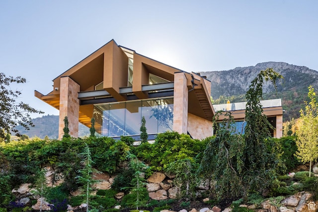 3826 E Thousand Oaks Cir, Salt Lake City, UT 84124 - view of property exterior with a mountain view and stucco siding