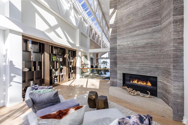 3826 E Thousand Oaks Cir, Salt Lake City, UT 84124 - living room featuring a fireplace and a wealth of natural light