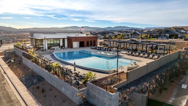 1519 N Horizon Pkwy Unit 98, Washington, UT 84780 - community pool featuring a mountain view, a community hot tub, a residential view, and a patio area