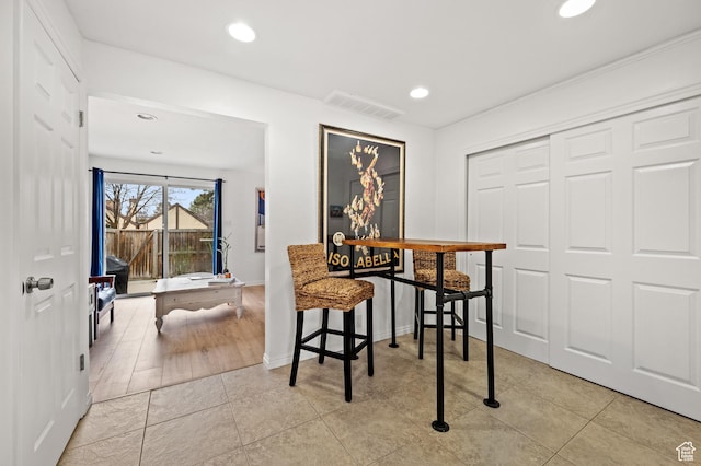 dining room with recessed lighting, visible vents, and light tile patterned flooring