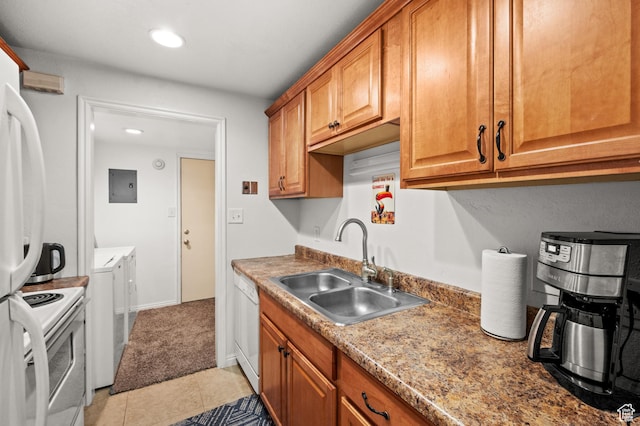 kitchen with light tile patterned floors, white appliances, a sink, electric panel, and brown cabinets